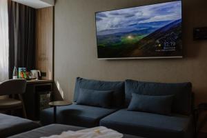 Ein Sitzbereich in der Unterkunft Lumière Hotel Pool & SPA