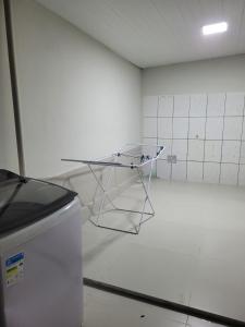 Mynd úr myndasafni af Casa funcional - 02 quartos, 02 camas de casal, 01 cama de solteiro, cozinha gourmet e garagem para carro pequeno í Ji-Paraná