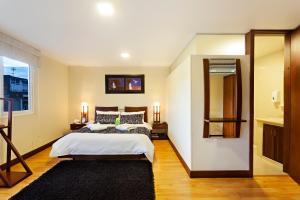 Ένα ή περισσότερα κρεβάτια σε δωμάτιο στο Loft Hotel