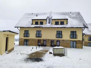 Apartmán JUZION skiareál Bukova hora v zimě