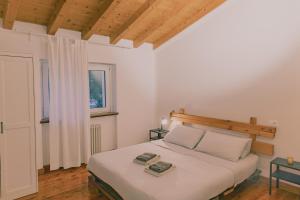 Postel nebo postele na pokoji v ubytování CA11 - Apartments