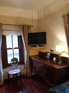 A television and/or entertainment centre at Windmill House, Clongill