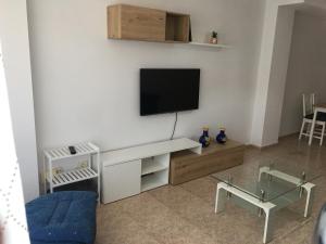 TV a/nebo společenská místnost v ubytování El Inferniño