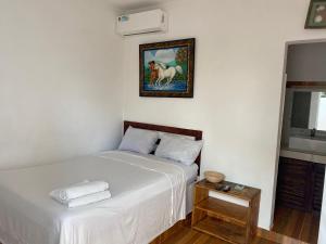Postel nebo postele na pokoji v ubytování Hotel El Encanto + 28 fotografií