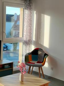 Posezení v ubytování Appartement à 50 m de la mer, idéal famille