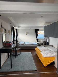 A bed or beds in a room at chapter-one