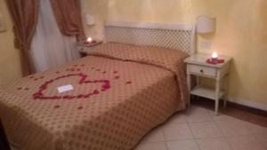 Posteľ alebo postele v izbe v ubytovaní Casa Mimma