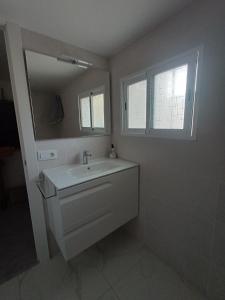 Koupelna v ubytování Chalet con piscina LUA HOME