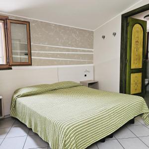 Postel nebo postele na pokoji v ubytování B&B Villa Maria