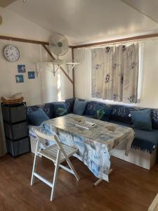 Posezení v ubytování Bungalow tout confort