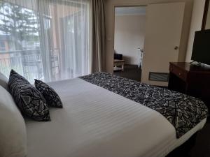 Charbonnier Motor Inn客房内的一张或多张床位
