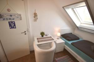 Postel nebo postele na pokoji v ubytování Ferienwohnung Zwergpinscher