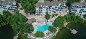 an aerial view of a resort with a swimming pool at Regatta Bay Getaway-Luxury Lakefront Condo/2BD/2BA/Deck/Pool/Dock-6PP in Lake Ozark