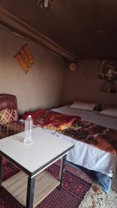 Postel nebo postele na pokoji v ubytování Camel House camp