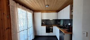 A kitchen or kitchenette at Chalet Bergmann