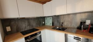 A kitchen or kitchenette at Chalet Bergmann
