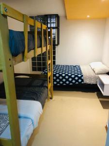 Postel nebo postele na pokoji v ubytování LOFT CHAKRA