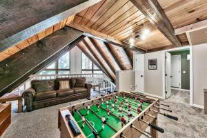 a living room with a pool table at Stay Cool! AC - Foosball - Nature Escape in South Lake Tahoe