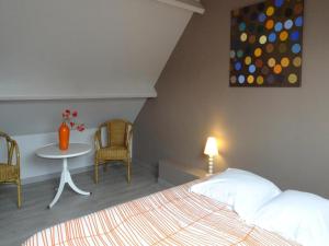 Ένα ή περισσότερα κρεβάτια σε δωμάτιο στο Holiday Home in Portbail near Sandy Beach