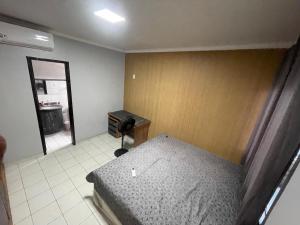 Ένα ή περισσότερα κρεβάτια σε δωμάτιο στο Casa para a COP30