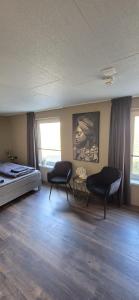 Postel nebo postele na pokoji v ubytování Hotel 'De Heren'