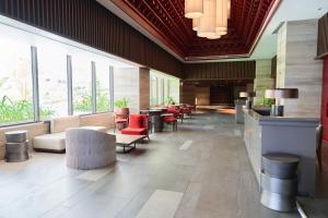 Ein Sitzbereich in der Unterkunft The Apec Mandala Ocean View Mui Ne - Condotel