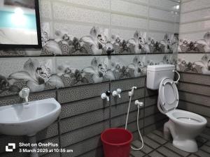 Koupelna v ubytování Hotel Grand Arputha
