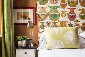 Vmaison Hotel Messina客房内的一张或多张床位