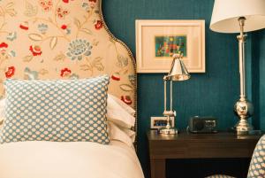 Vmaison Hotel Messina客房内的一张或多张床位