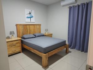 Postel nebo postele na pokoji v ubytování Villa K-12