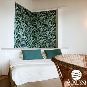 Postel nebo postele na pokoji v ubytování Andrea Lodges