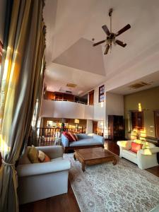 Posezení v ubytování Bed & Breakfast Chiang Rai