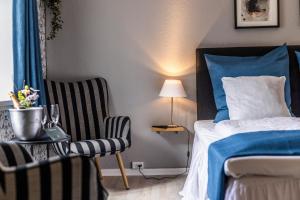 Postel nebo postele na pokoji v ubytování Marsk Hotellet