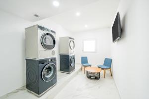 Holiday Inn Express Greater Noida Knowledge Park by IHG的电视和/或娱乐中心
