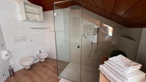 Koupelna v ubytování mardolomiti suite