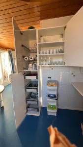 Kuchyň nebo kuchyňský kout v ubytování mardolomiti suite