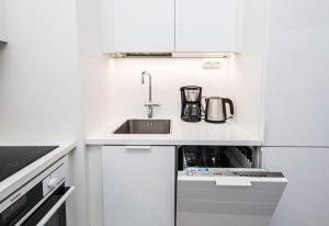 Dapur atau dapur kecil di Kotimaailma - Modern city studio in Vaasa city center +1 gambar