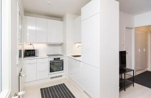 Dapur atau dapur kecil di Kotimaailma - Modern city studio in Vaasa city center