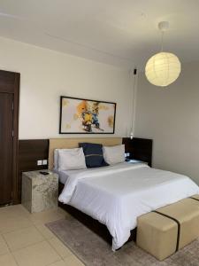 Postel nebo postele na pokoji v ubytování Centurion Aparthotel