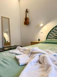 Postel nebo postele na pokoji v ubytování B&B Il Mare di Terrasini