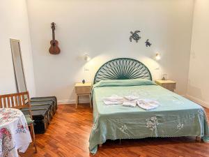 Postel nebo postele na pokoji v ubytování B&B Il Mare di Terrasini