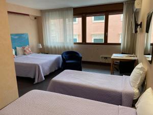 Postel nebo postele na pokoji v ubytování Mare Nostrum Petit Hôtel + 37 fotografií
