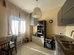 Η κουζίνα ή μικρή κουζίνα στο IseoLakeRental - Casa Unicum