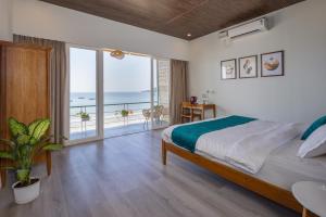 Katil atau katil-katil dalam bilik di Royal Touch Beach Huts