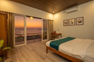 Katil atau katil-katil dalam bilik di Royal Touch Beach Huts