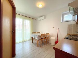 Kuchyňa alebo kuchynka v ubytovaní Apartments Capic Z