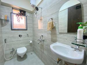 Koupelna v ubytování Sheetal Vaibhav 902 + 17 fotografií