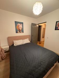 Postel nebo postele na pokoji v ubytování Apartament Maria