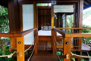 Balcone o terrazza di Coconut Corner - Ocean View Treehouse