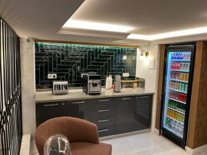 Kuchyň nebo kuchyňský kout v ubytování Nida Hotel Cıty Center